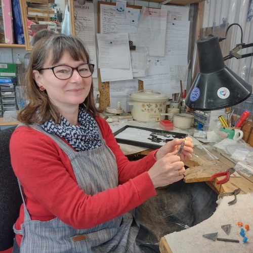 Sarah Packington, jewellery at her bench in Brighton